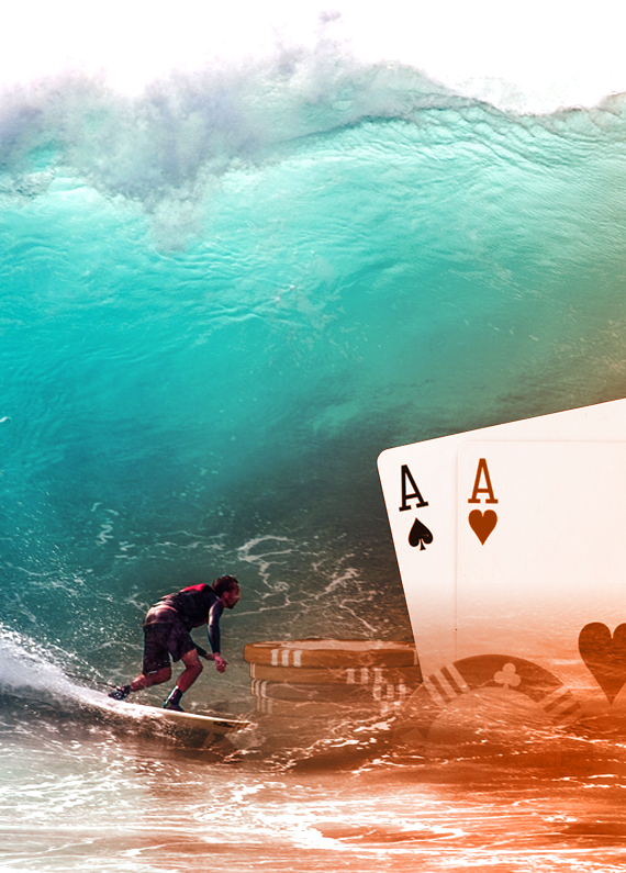 Playing cards and woman surfing over big waves