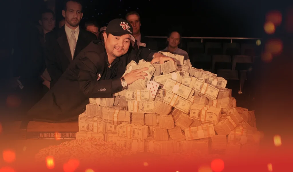 Man in Full Tilt hat embracing massive pile of cash after poker victory.
